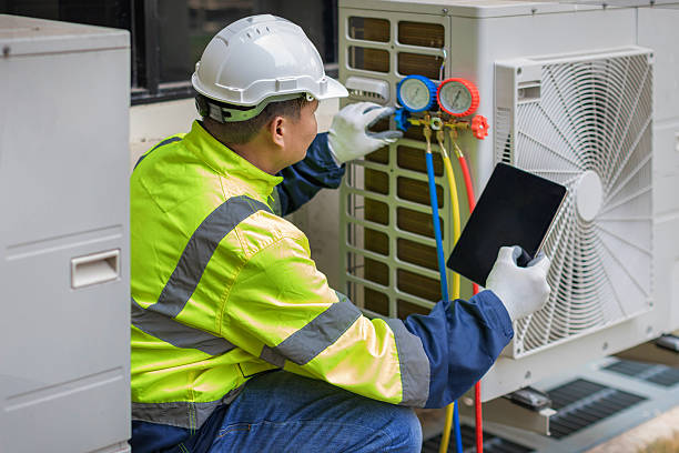 Professional Hvac Maintenance technician working in Baldwin Place, NY